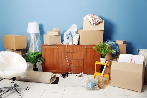 Loading boxes and furniture into a hire removal truck for a Knightsbridge property move