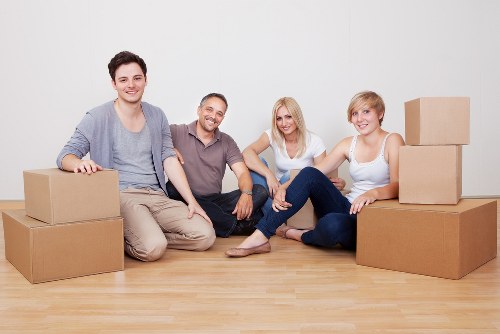 Careful loading of household items for a move in Knightsbridge